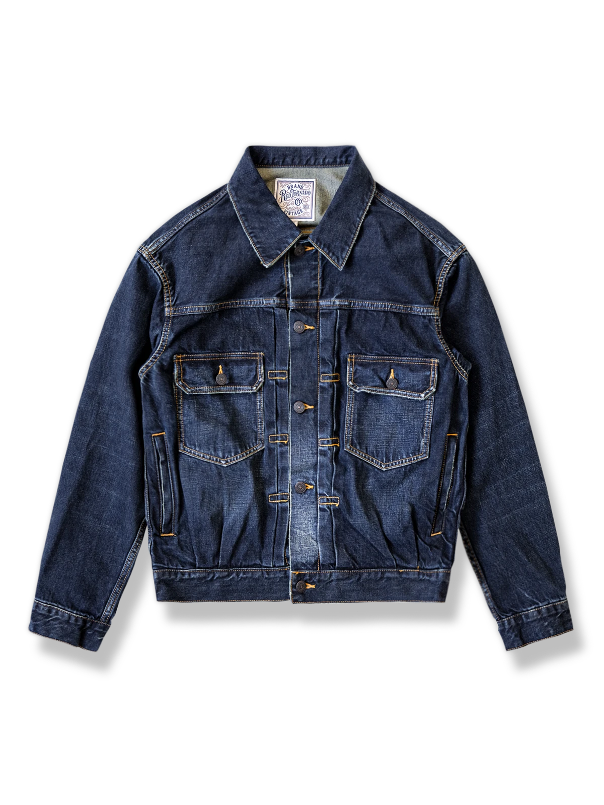 職人手作りのウォッシュ加工デニムジャケット。