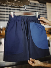 アシンメトリー カラーブロック カーゴショーツ全体像（インディゴ／ライトブルー／ネイビー）