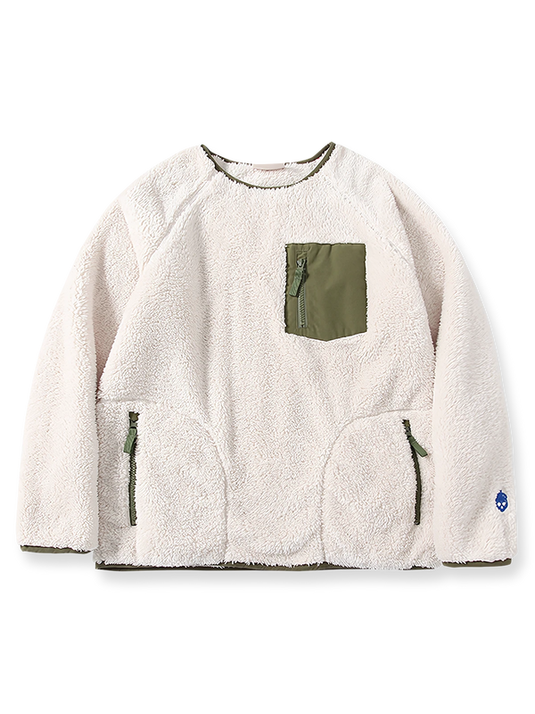 日本製コーラルフリースとパッチワークを使用した保温性高いバイカラースウェット。刺繍ポケットとYKKジッパー付き。