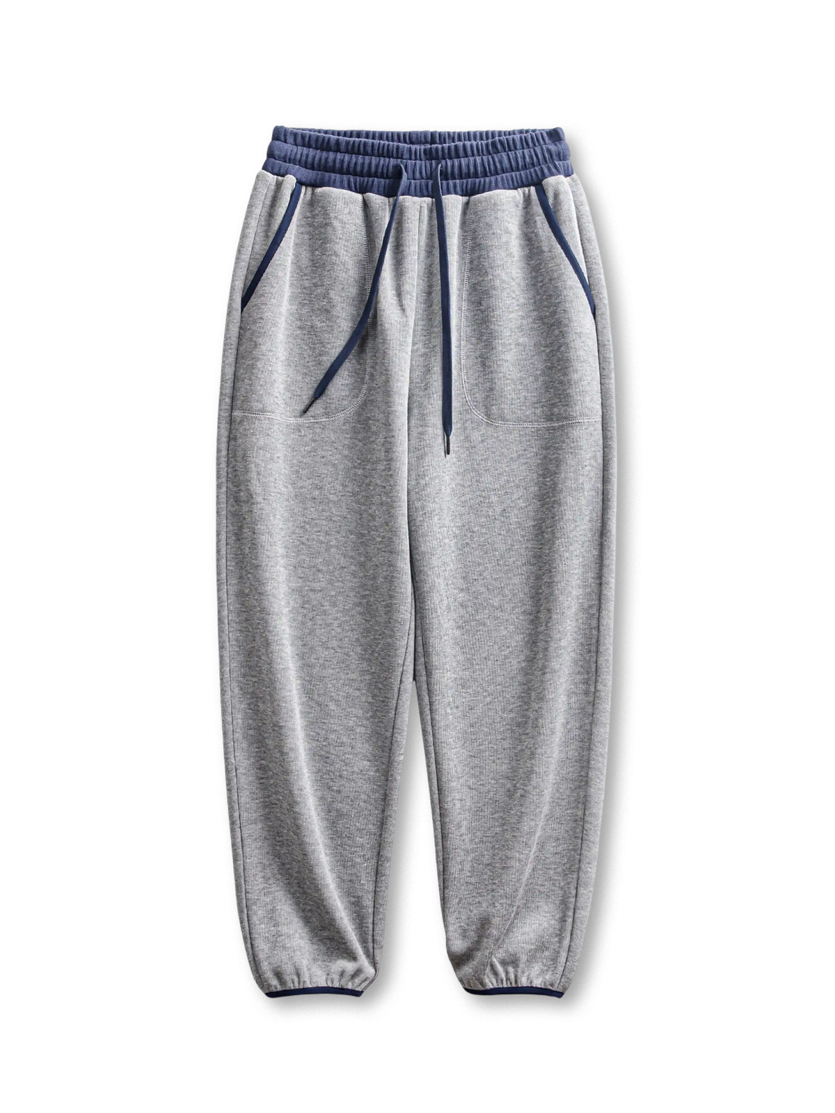 バイカラーリブとジョガーシルエットが特徴の裏起毛厚手パンツ。保温性と快適さを兼ね備えています。