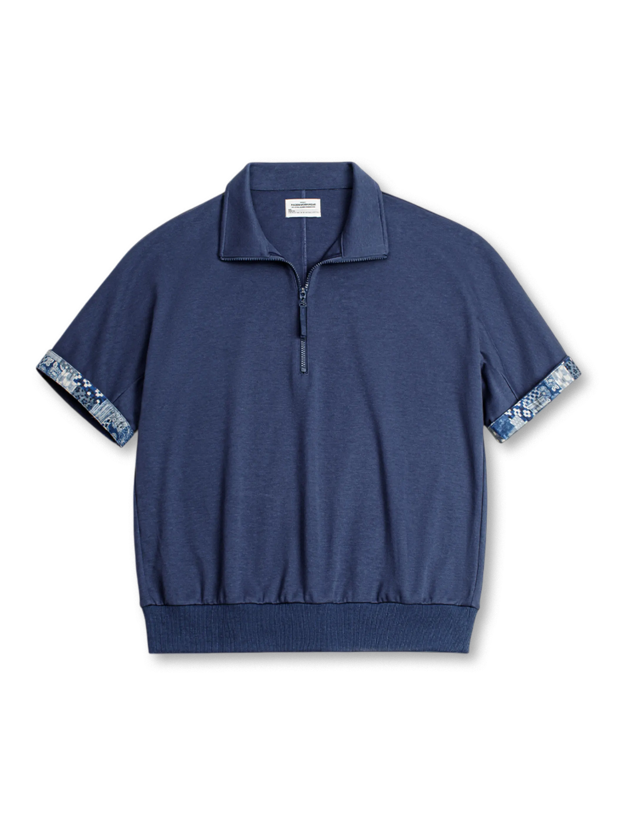 伝統的刺し子風パッチワークが特徴のBORO風ハーフジップポロシャツ。着脱しやすく多用途に活躍。