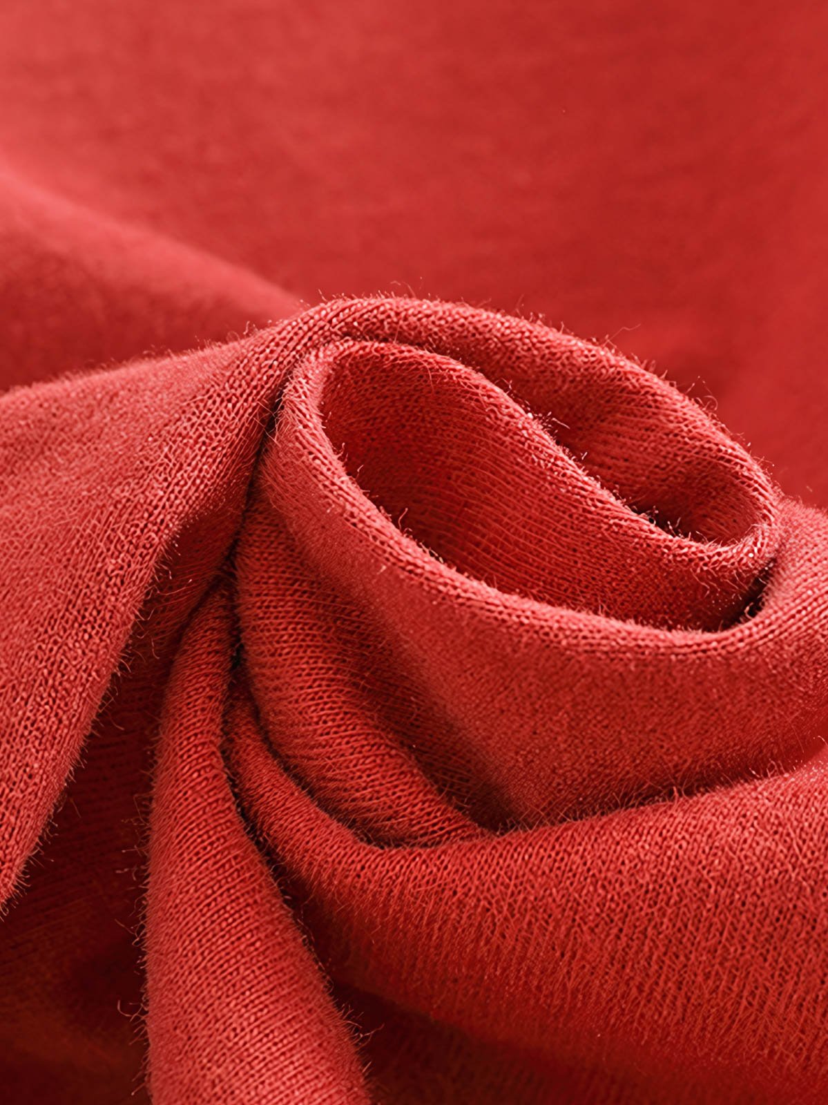 製品画像: BROOKLYNヴィンテージプリント長袖Tシャツの全体展示 詳細画像: Tシャツの裾にあるパッチワークデザインのディテール