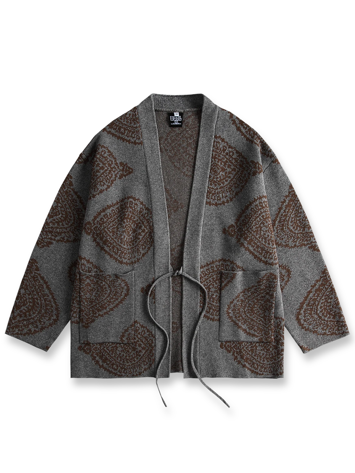 カシュクール柄ジャカードのVネックニットはんてん。民族的なデザインと優れた保温性が特徴。