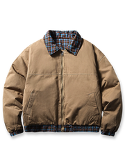 クラシックなチェック柄と無地の両面リバーシブル仕様で保温性と快適性を備えた中綿ジャケット