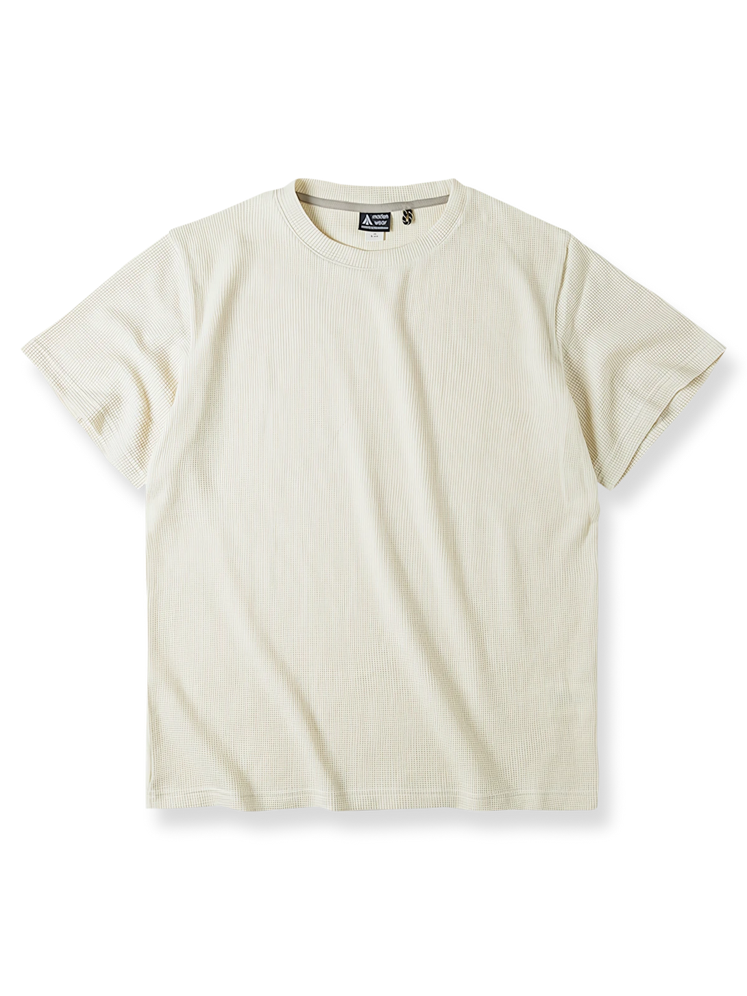 格子状のワッフル織りとベージュカラーが特徴のクラシックワッフルニットTシャツの画像。