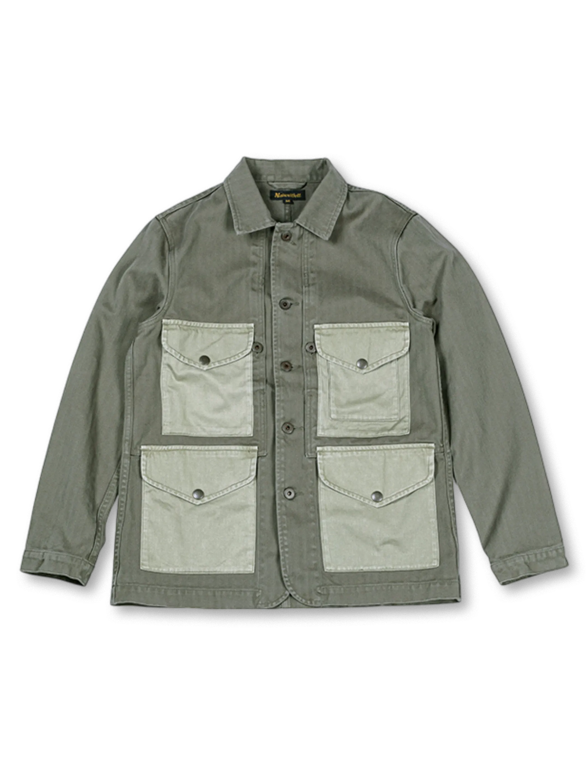 伝統的ハンティングジャケット着想の100%コットンツイード製カラーブロックジャケット。大容量ポケット付き。