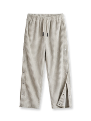 ボタン付きサイドと太畝コーデュロイが特徴のストレートスウェットパンツ