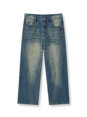 ダブルトラックアーチカットとウォッシュド加工が特徴のストレートフィットデニムパンツの全体像。