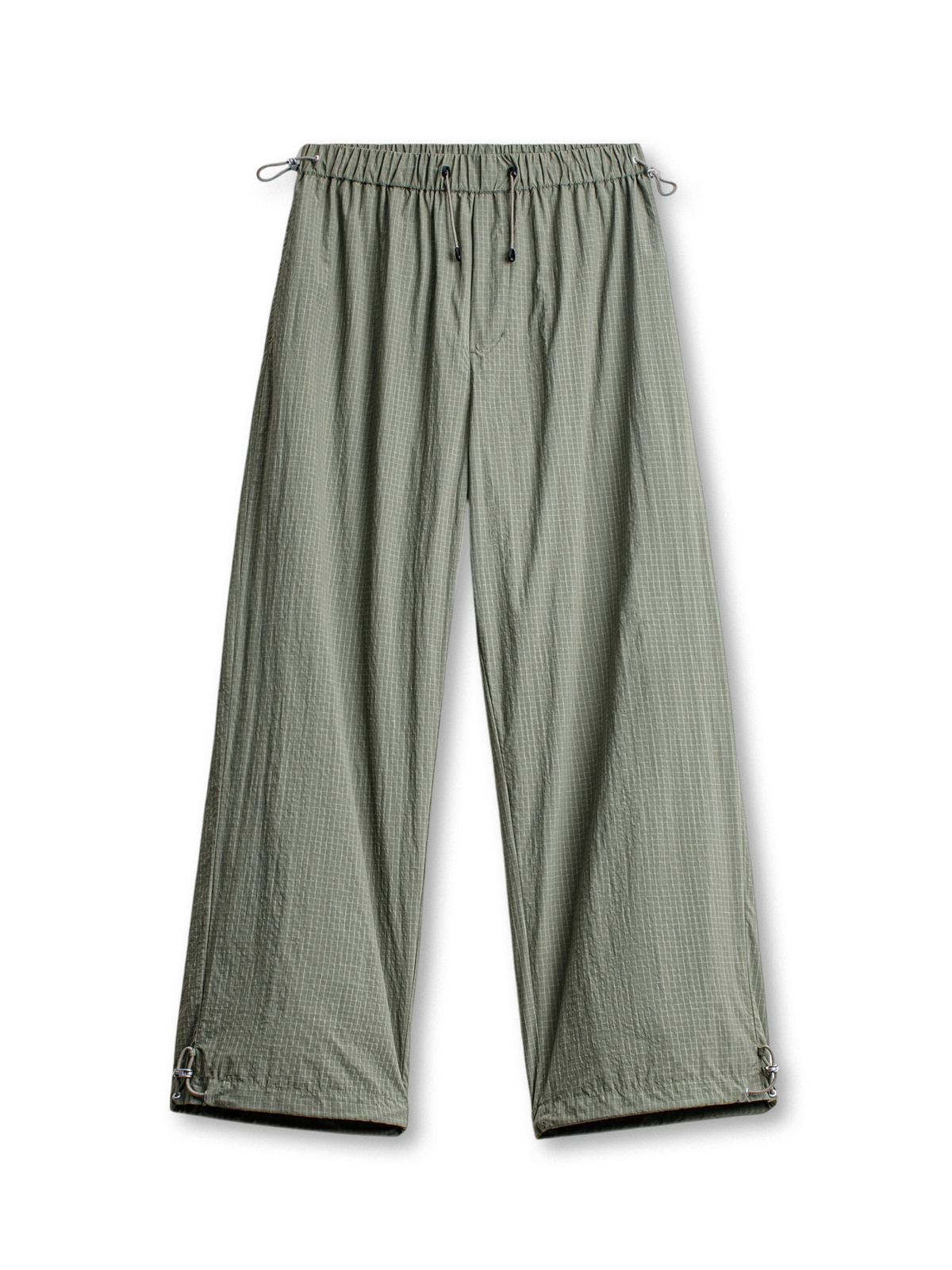 方格状テクスチャのヴィンテージ感あるドローコード付きジョガーパンツ。メタルスナップと調節可能な裾。