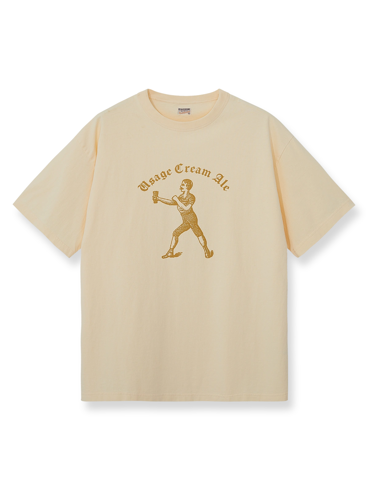 DRINKING TEAMロゴのジンジャーイエロー×アイボリー配色ヴィンテージTシャツ。