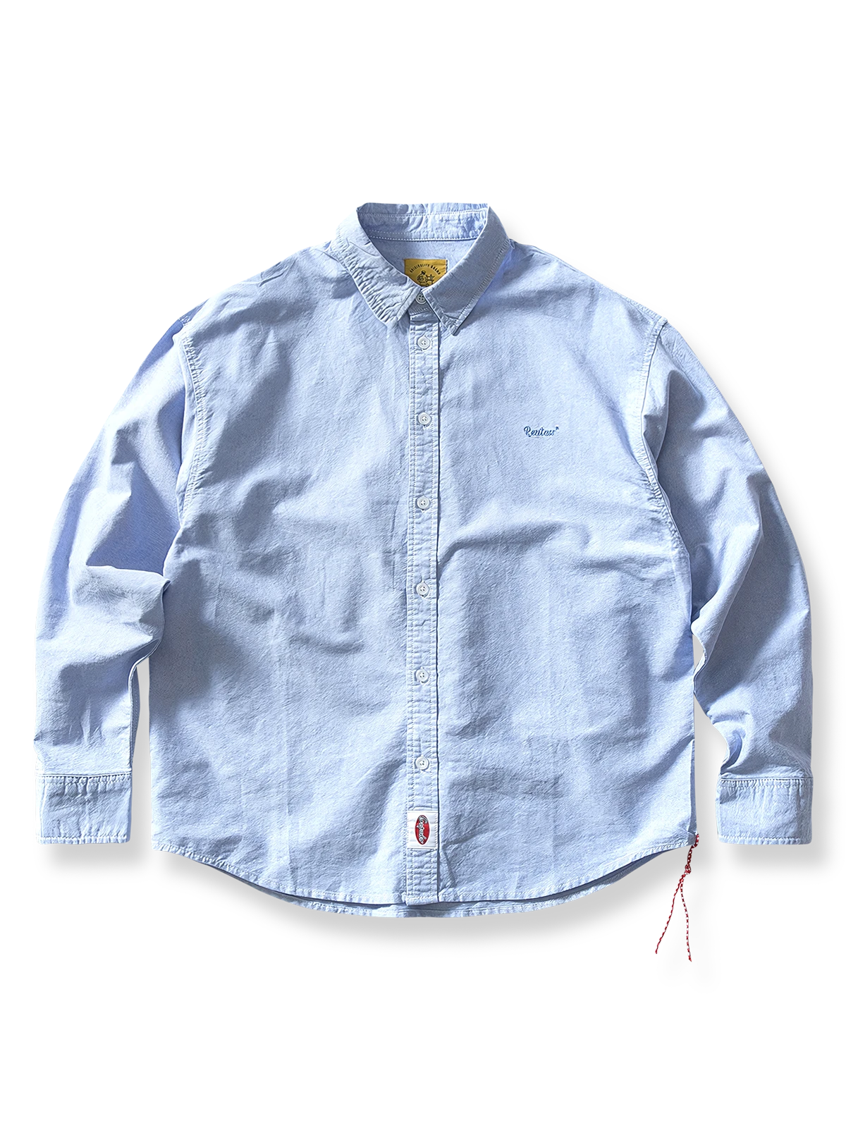 胸元に刺繍が施されたクラシックなオックスフォード長袖シャツ。