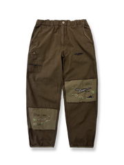 刺繍パッチワークが施されたコットンキャンバススラックス