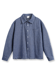 フリンジ加工チェック柄シャツの全体正面画像、フリンジヘムとチェック柄のディテール。