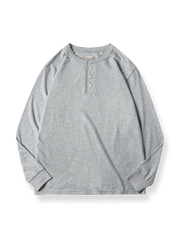 厚手コットンのルーズフィット長袖ヘンリーTシャツ