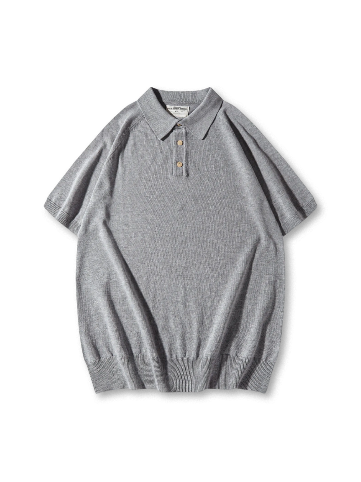 高密度コットンチェック生地とラグランスリーブが特徴の上品なオーバーシャツ