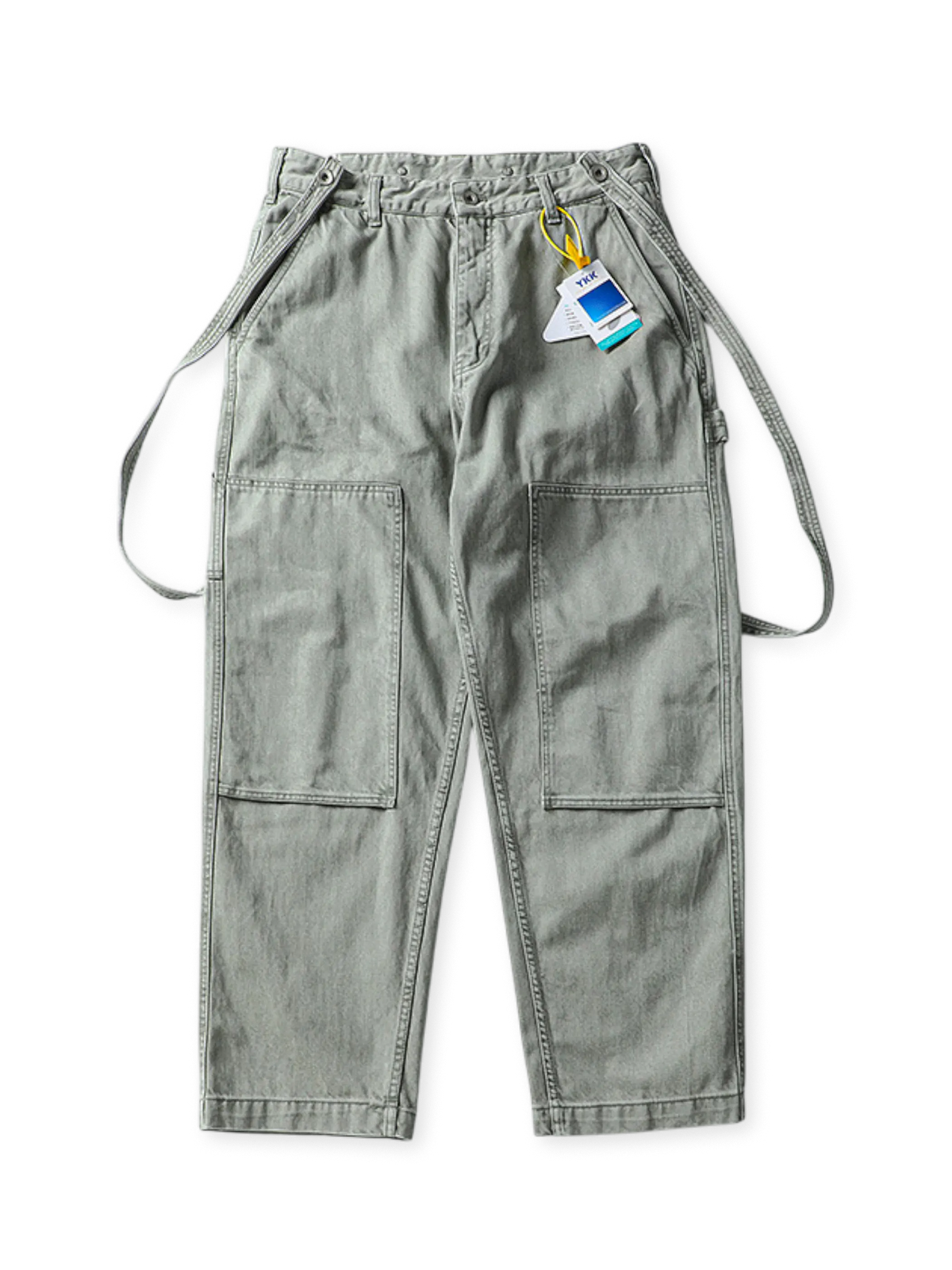 耐久性の高い高密度ヘヴィーコットンを使用し、サスペンダーデザインと多ポケットが特徴の伐採風ワークパンツ。4色展開。