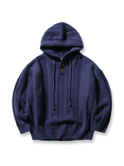 ストライプと編み模様が特徴のフード付きプルオーバーセーター