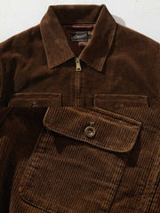 胸前の大きなフラップポケットとコーデュロイ素材のディテール - 秋冬のエレガントなスタイル