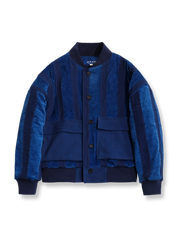 藍染めストライプパッチワークとコーデュロイ素材が特徴のスタンドカラージャケット。