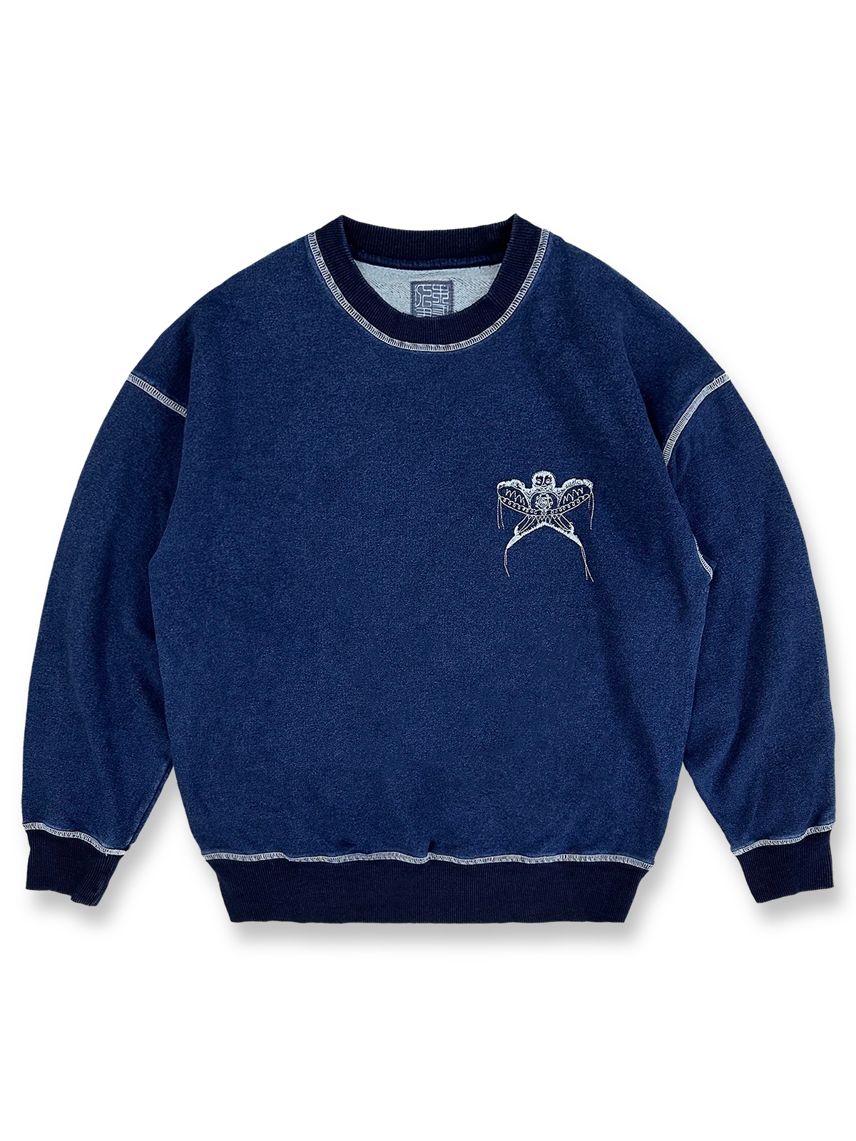藍染めとスワローカイト刺繍が特徴のコットンスウェット