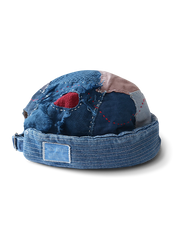 古布パッチワークとインディゴウォッシュ加工を施したヴィンテージセーラーハット。手縫いステッチとヴィンテージロゴが特徴。