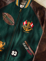 ジャケットのディテール。IDEAL社製銅製ジッパーとレザーの袖を示す。