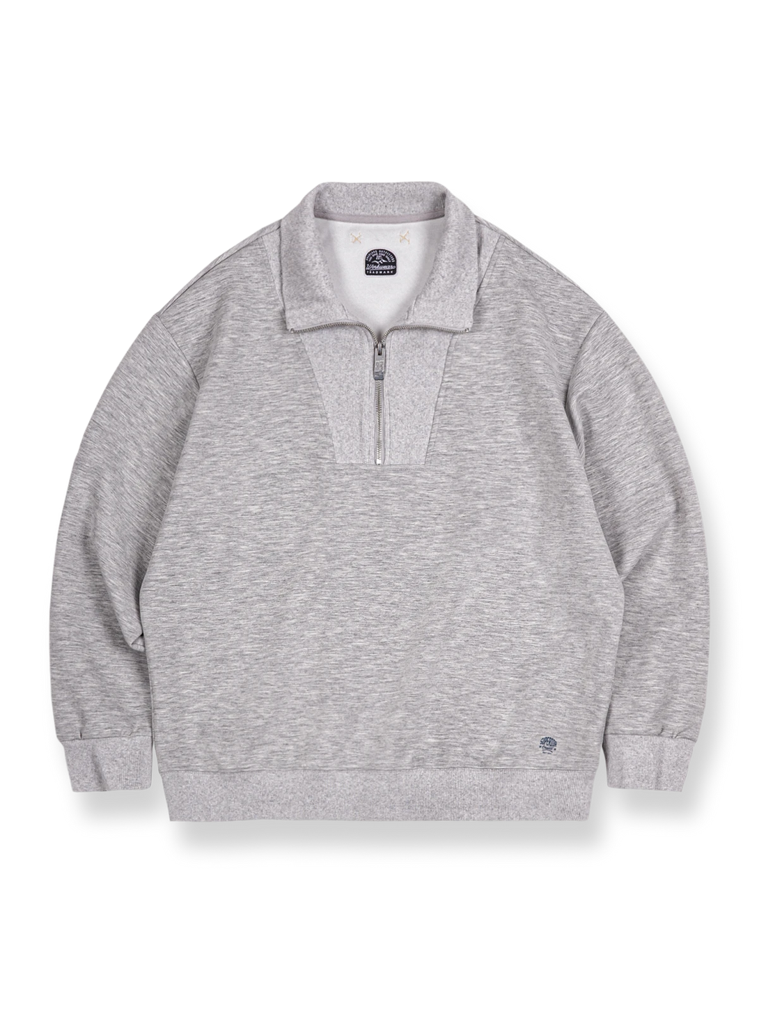 トラペゾイド型スタンドカラーとハーフジップが特徴のIvy風スウェットシャツ。