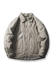 大きなポケットとデザインラインが特徴の中綿ジャケット・ヴィンテージ感と機能性を兼備