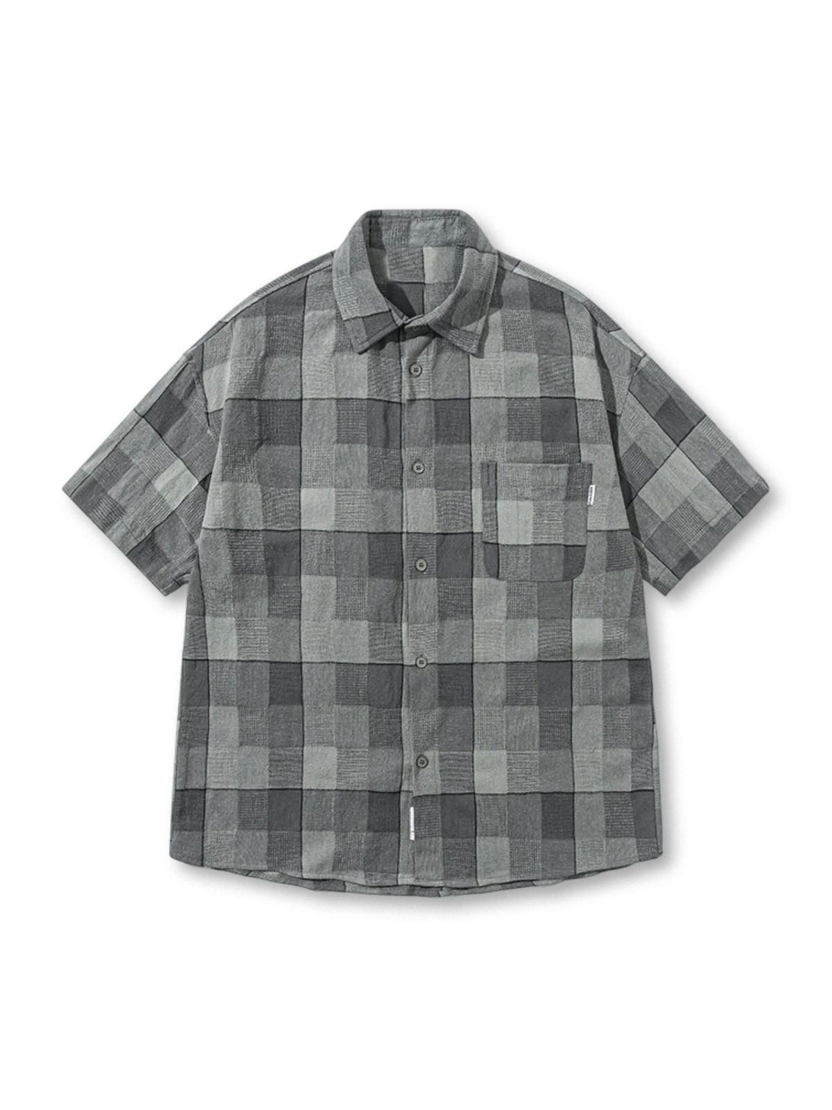 伝統的なチェック柄とヴィンテージワーク感が特徴のルーズフィットシャツ