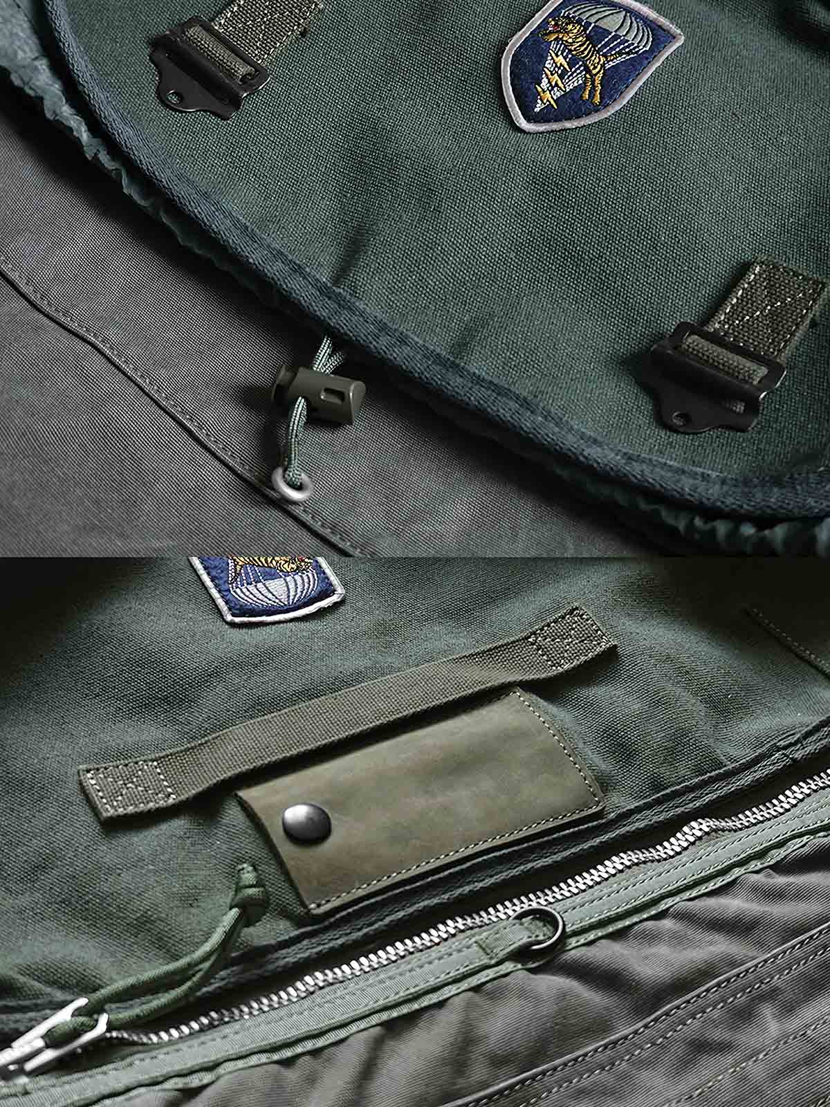 製品画像: M67アメカジ風ヴィンテージキャンバスウォッシュショルダーバッグの正面画像。クラシックなM67デザインとヴィンテージ加工が特徴で、日常やライディングに最適。

詳細画像: M67ヴィンテージキャンバスバッグのワッペンとウォッシュ加工のディテール画像。耐久性のあるディテールと独自のヴィンテージ感を強調。