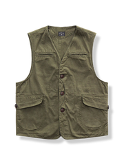 マルチポケットと月形カットを施したユニセックスベスト。