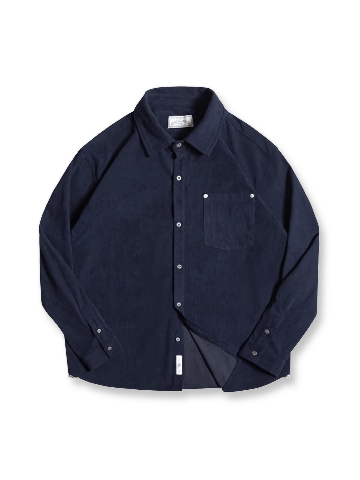 製品画像：ヴィンテージコーデュロイシャツの正面展示。シンプルなデザインとNAVAJOラベルが特徴のシャツ。
詳細画像：胸元のリベットデザインと裾のNAVAJOラベル。ヴィンテージ感のあるディテール。