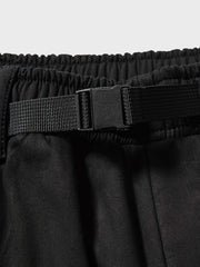 裾絞り ウェビングベルト付きスラックス