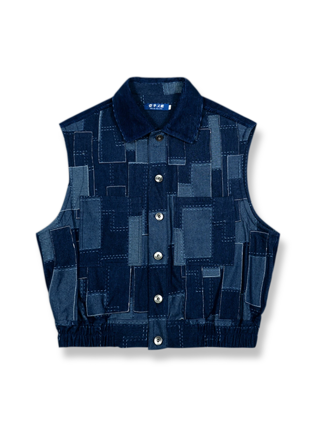 異なる色調のコーデュロイパッチワークとワイドショルダーが特徴のベスト