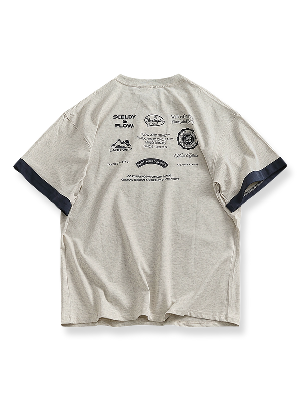 パッチワークカフスと両面プリントが特徴のコットン半袖Tシャツ