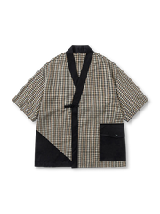 チェックと無地切り替えが特徴の民族風パッチワークはんてん。紐留めと大きめポケット付きで快適な着心地。