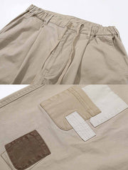 YKKジッパーとボタン、ウォッシュド加工によるヴィンテージ感のディテール