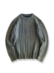 植物染めで青藍色に仕上げたコットンケーブルニットセーター。