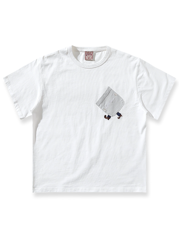 リトルピープル刺繍と斜めポケットが特徴のパッチワーク風半袖Tシャツ