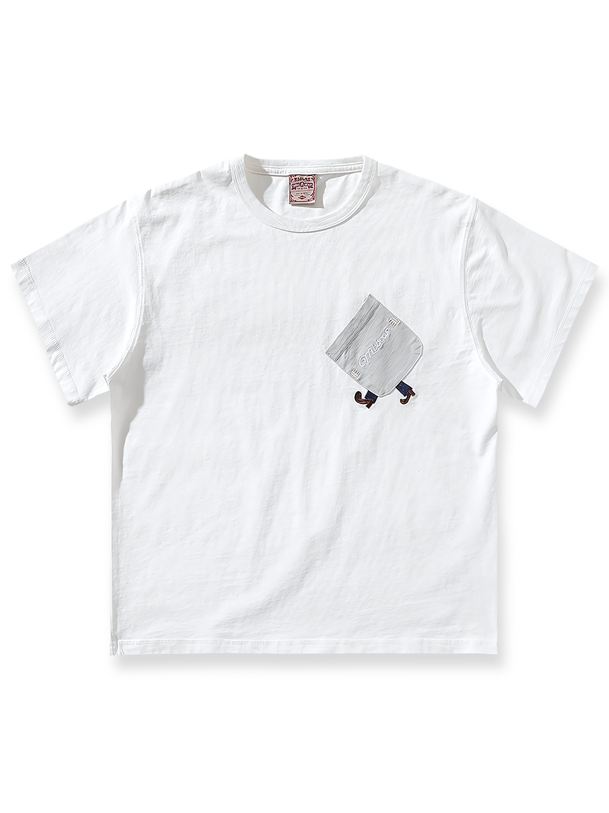 リトルピープル刺繍と斜めポケットが特徴のパッチワーク風半袖Tシャツ