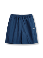 速乾性と通気性を備えたナイロン素材のスポーツショートパンツ