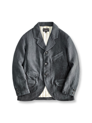 20世紀初頭風ヴィンテージ素材とラウンド裾が特徴のリラックスフィットカジュアルスーツジャケット。