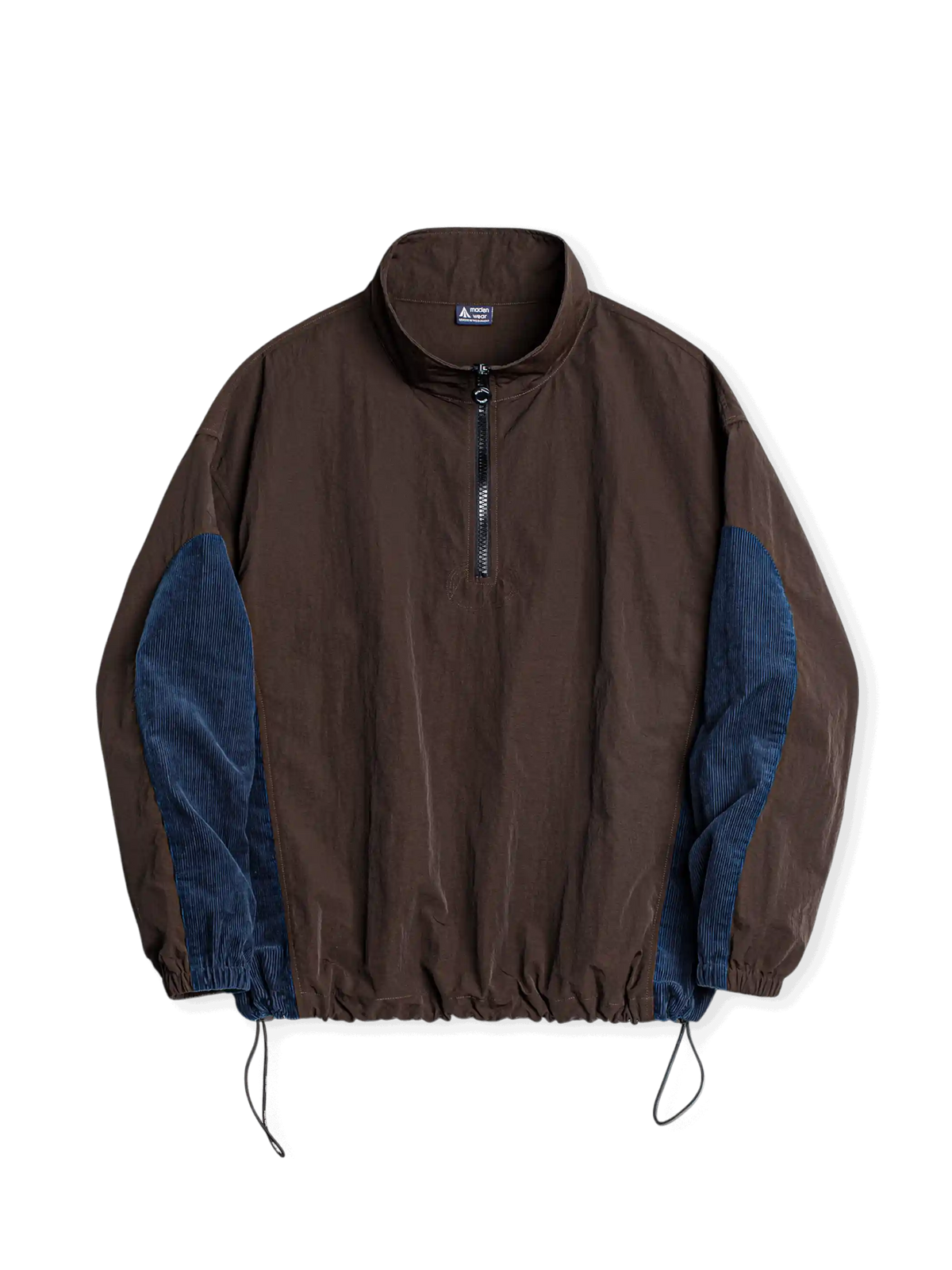 軽量シボ加工ナイロンとヴィンテージブルーコーデュロイのパネルコンビネーションハーフジップジャケット。プロテクションパネル付き。