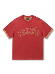 リバーシブル仕様で異なるカラーリングと立体刺繍ロゴが特徴のカレッジジャージ風Tシャツ。