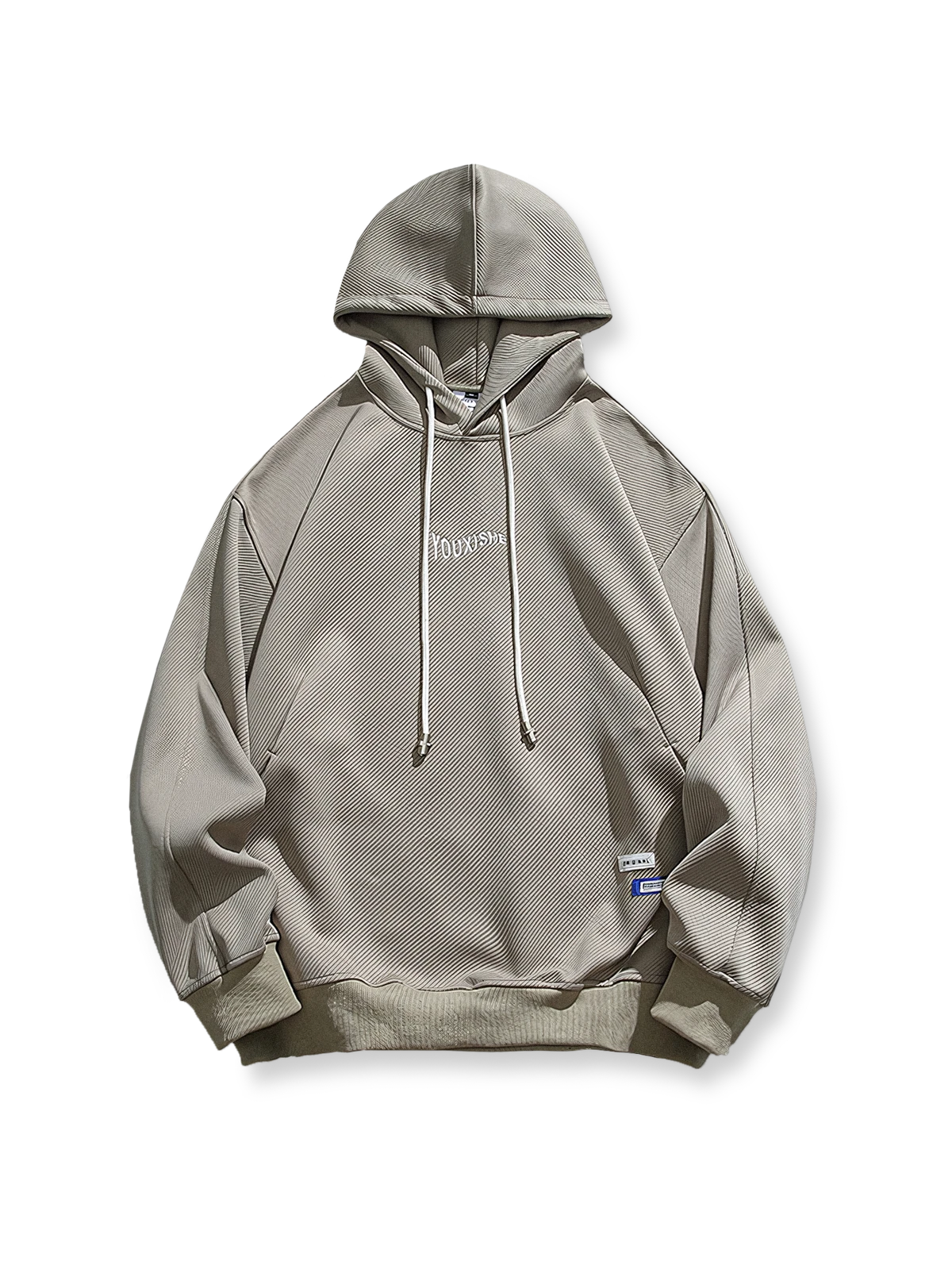 リブ織りのテクスチャーが特徴のフーディースウェット。