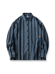 スカルバッジがアクセントのストライプ柄ルーズフィットワークシャツ