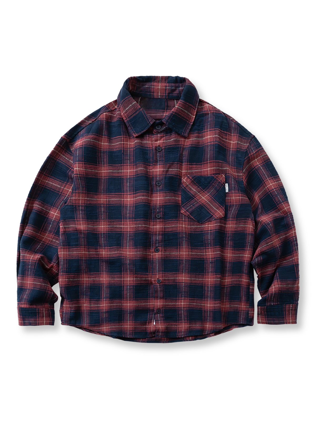 竹節編みコットン素材のチェック柄シャツ。レトロな落ち感と視覚的アクセントの斜めポケットが特徴。