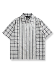 ストライプとチェックのパッチワークが特徴の半袖シャツ