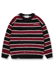 カラフルなストライプ柄とダメージ加工が特徴のゆったりクルーネックニットセーター