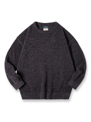 フェード加工が施された3色展開のドロップショルダーニットスウェット。